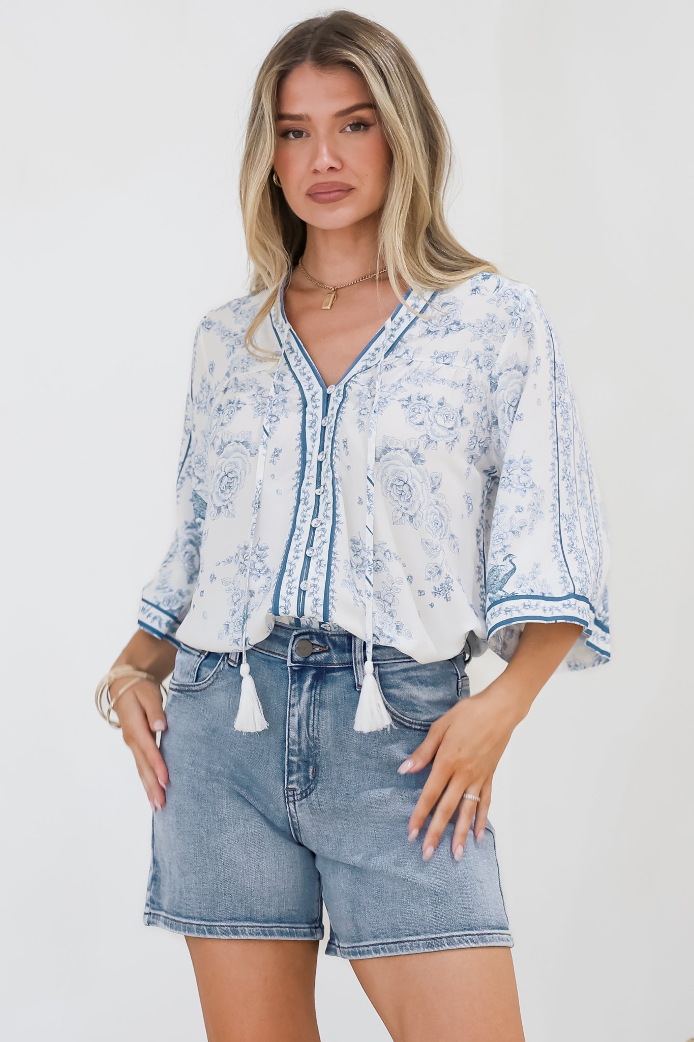 Women’s Printed V-Neck Button Front Blouse