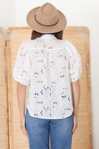 Women’s Short Sleeve V-Neck Blouse with Eyelet Pattern and Front Button Closure