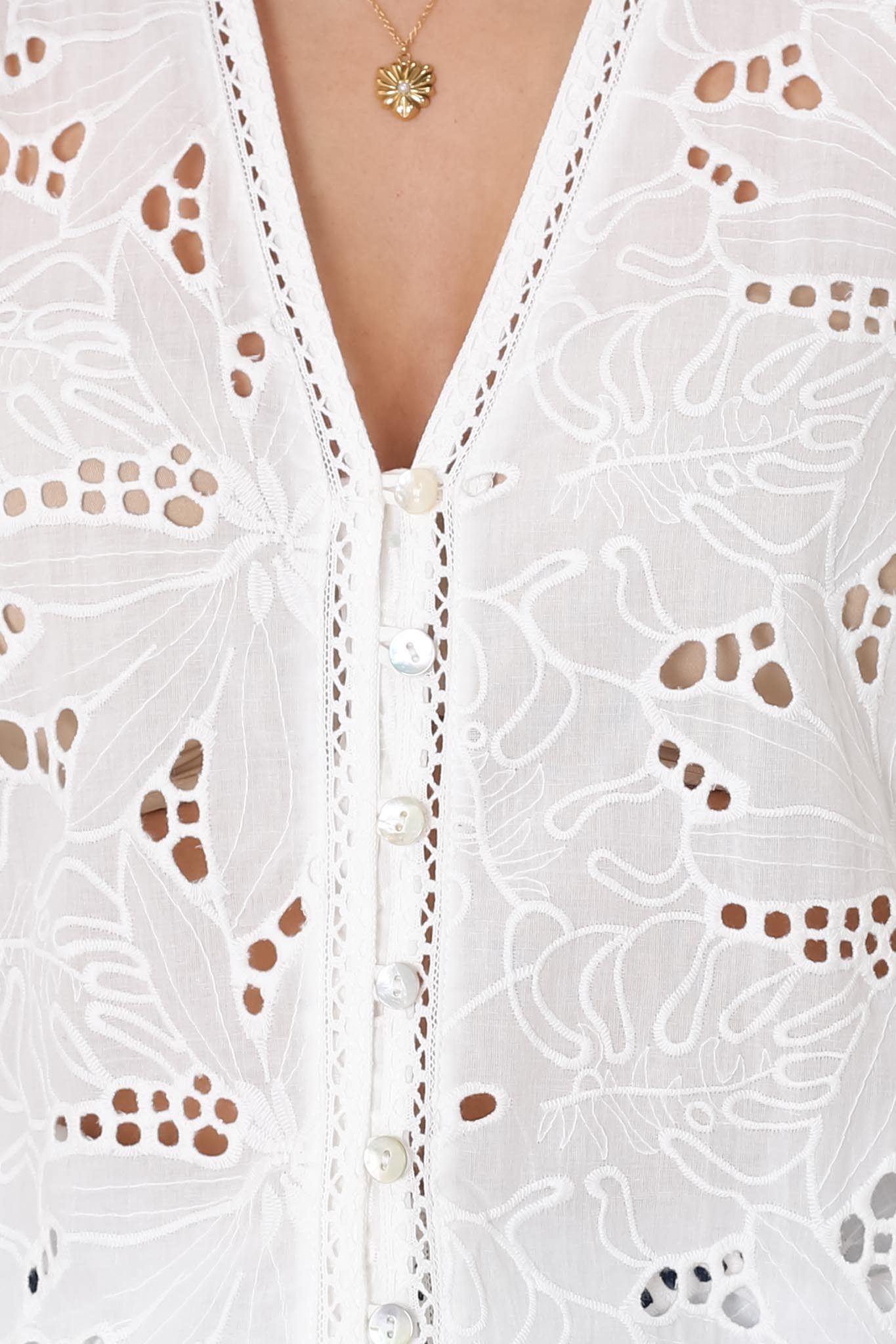 Women’s Short Sleeve V-Neck Blouse with Eyelet Pattern and Front Button Closure