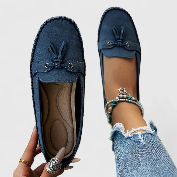 Women’s Rounded Toe Slip-On Moccasin Flats with Tassel Lace Detail