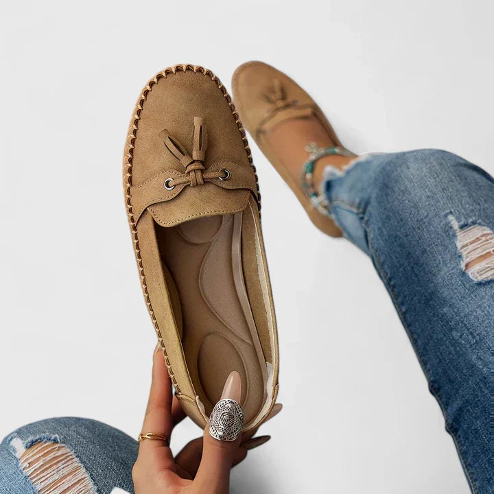 Women’s Rounded Toe Slip-On Moccasin Flats with Tassel Lace Detail